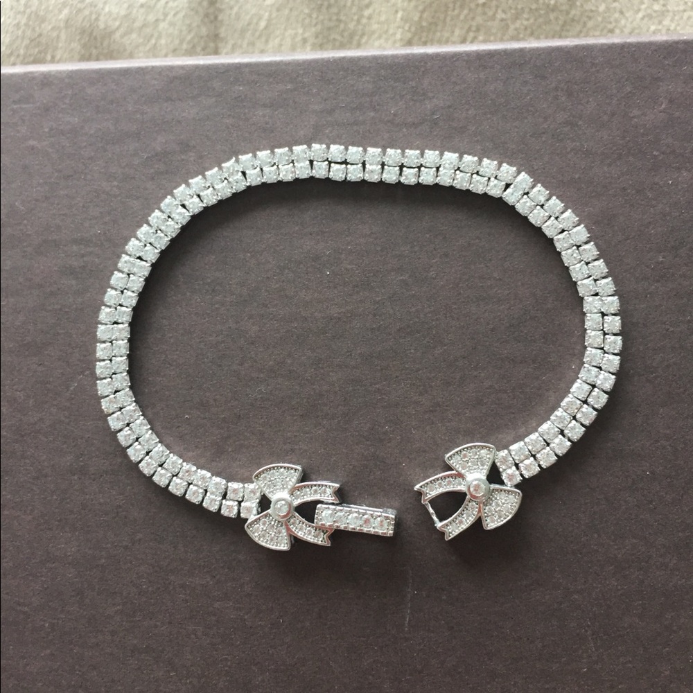 Silver CZ bracelet. Stamped 925
7 inches in length